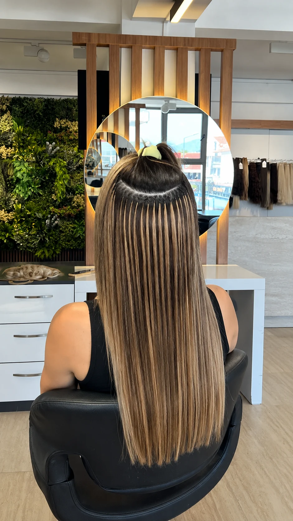 Keratin bond hair extensions applied to natural hair